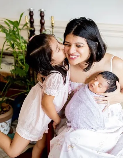The sweetest kiss from a big sister. Capturing the bond between siblings is one of the most heartwarming parts of my job.