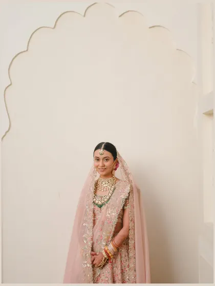 Simplicity and grace. Using negative space and clean lines, this minimalist portrait puts all the focus on the bride's gentle smile and beautiful attire.