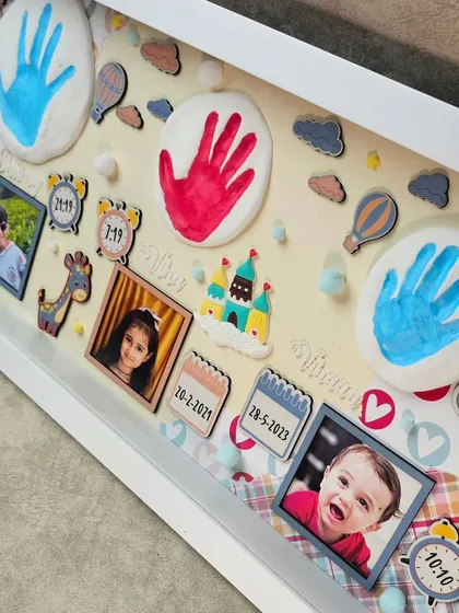 A detailed shot of the hand impressions and personalized elements in the memory frame. We can customize the theme, colors, and details to match your story.