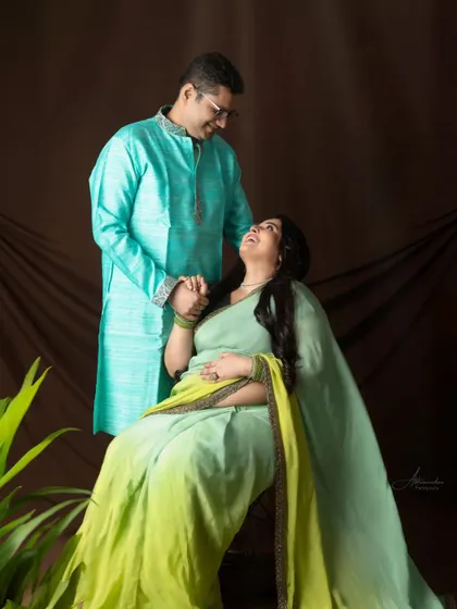 A moment of shared laughter. We love capturing these genuine expressions of joy that make your photo session a truly happy memory.