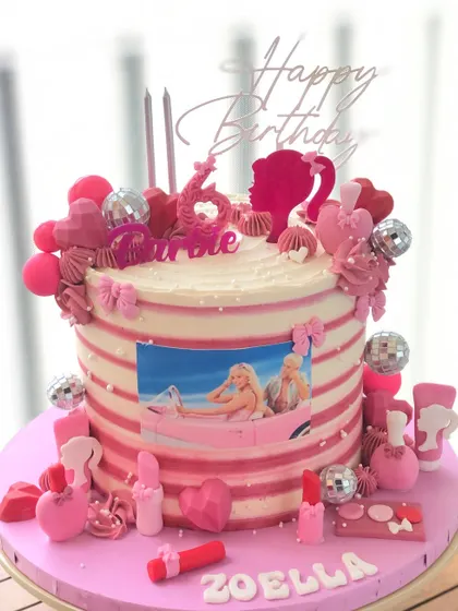 Come on Barbie, let's go party! A fun, trendy cake inspired by the Barbie movie, with lots of pink, disco balls, and iconic imagery.