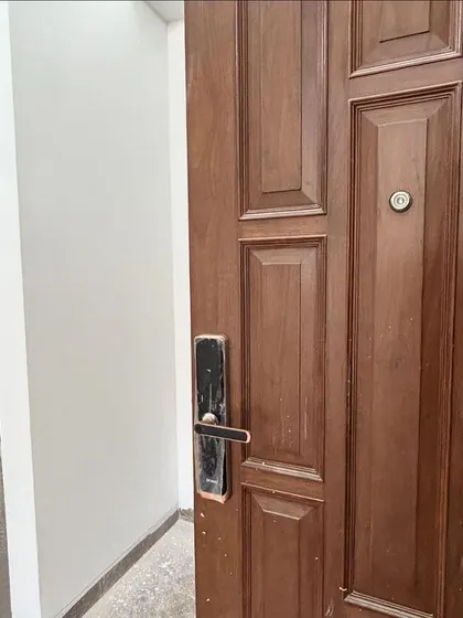 Even during construction, security is important. Here's the main entrance door with a modern digital lock, installed at our CR Park site.