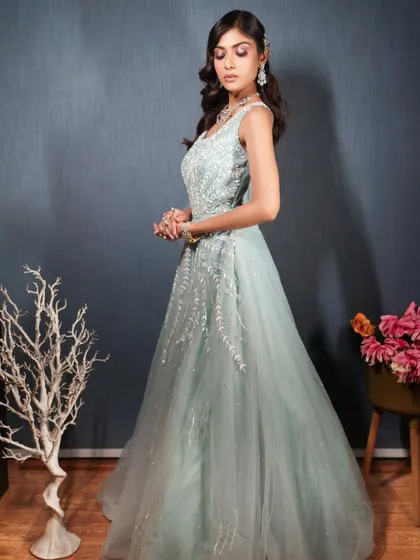 A model showing the elegant fall of the gown's fabric.