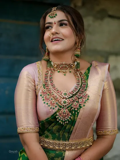 A candid shot of my client, looking joyful and radiant in her complete traditional ensemble.