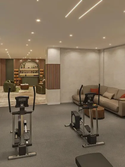 The gym is connected to a sophisticated bar area, making the basement a complete multi-functional retreat for wellness and entertainment.