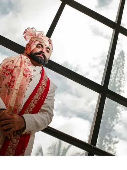 A stylish collage of the groom's portraits, using reflections and architectural lines to create a modern and dynamic look.