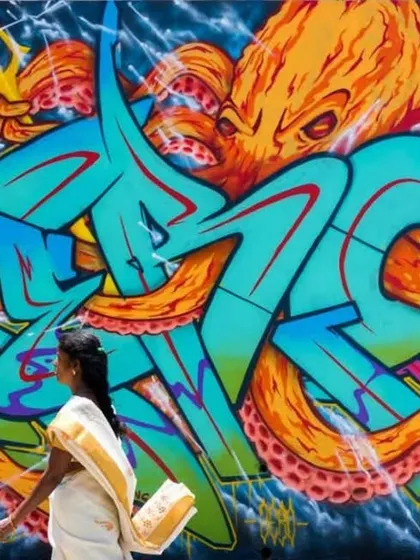 This mural in Nepal combines my signature lettering with a powerful octopus character, creating a dynamic piece for the MⒺTA-मोRPH-OSIS graffiti jam. It’s a great example of a large-scale character-based mural.