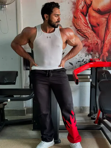A relaxed pose in the gym.
