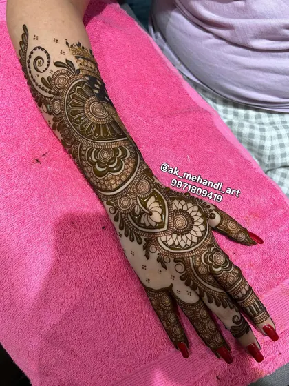 A beautiful example of a full-arm design, combining paisley, floral, and geometric elements for a rich, textured look.