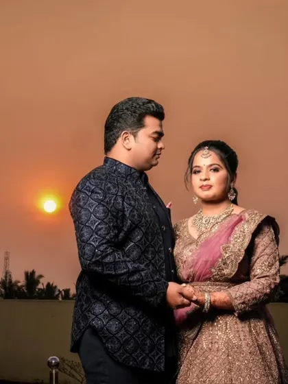 A beautiful sunset portrait from a Tirupur wedding reception, capturing the golden hour glow.