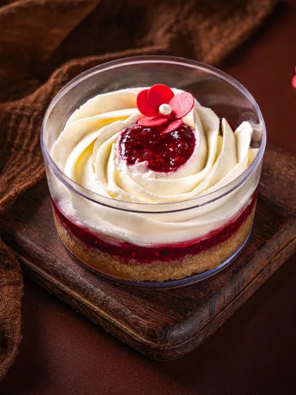 The Vanilla Berry tub offers a light and tangy flavor profile. I pair a smooth vanilla base with a vibrant berry compote for a refreshing and balanced dessert.