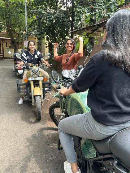 A graduate celebrates with her friends. Learning to ride together creates a special bond and shared memories.