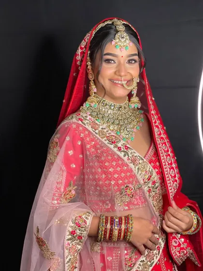 The joy of a bride is unmatched. This picture captures the happiness of looking perfect on your wedding day without the stress of buying.