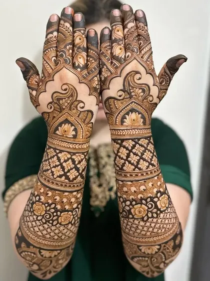 A beautiful design for the back of the hands, with large, flowing paisley and floral patterns.