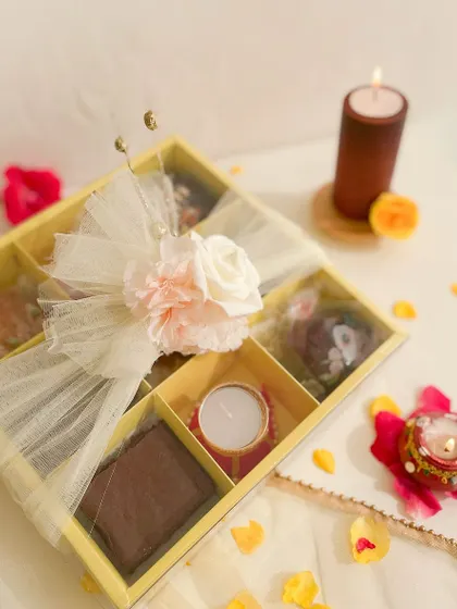 A larger Diwali hamper option, containing a wide assortment of our bestsellers including brownies, cookies, fudge, a teacake, and diyas.