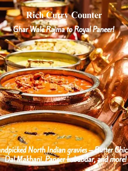 A rich curry counter featuring handpicked North Indian gravies like Butter Chicken, Dal Makhani, and Paneer Lababdar.