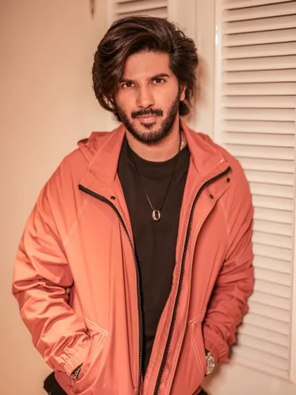 A portrait of Dulquer. This is a perfect example of an elevated everyday look for a star on the go.