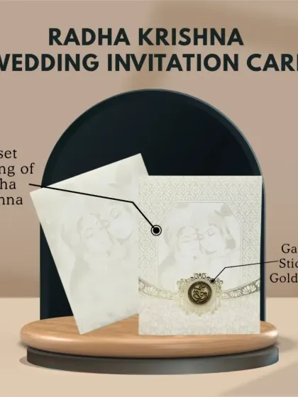 This Radha Krishna wedding invitation card features a subtle offset printing of the divine couple, complemented by a Ganesha sticker and gold foiling for a blessed beginning.