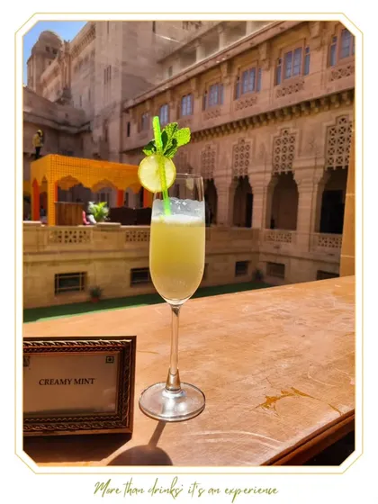 A "Creamy Mint" mocktail served in a champagne flute, showing that non-alcoholic drinks can be just as elegant.