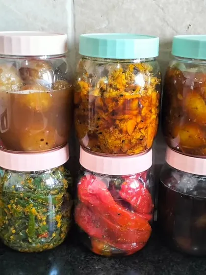 Here is a lineup of some of my most popular products. You can see the different colours and textures of my stuffed red chillies, mix vegetable pickle, and sweet lemon preserve.