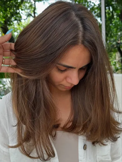 A trip back home from New York isn't complete without a hair appointment. Here's a look at the fresh, face-framing layers we did.