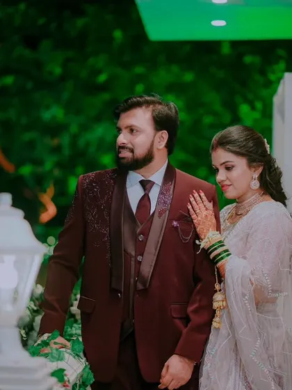 A romantic evening portrait of the couple, hand in hand, ready to begin their life's journey together.