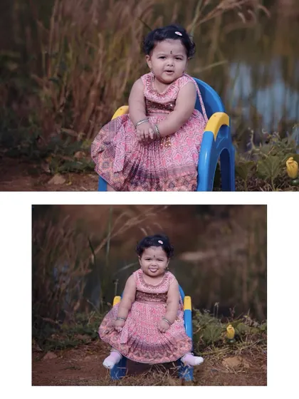 A delightful outdoor baby portrait. The baby girl is sitting happily in a small chair by the water, dressed in a lovely pink dress, showcasing her cheerful personality.