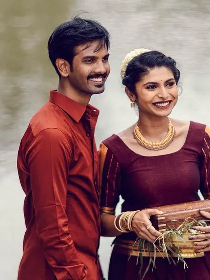 A duplicate of the happy, candid shot by the water.