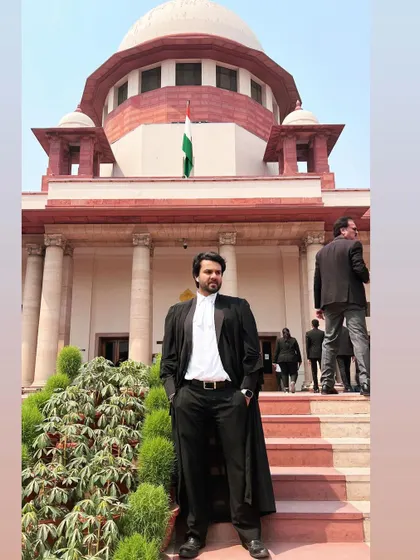 A confident stance outside the Supreme Court. As a criminal trial attorney, projecting strength and readiness is part of the job.