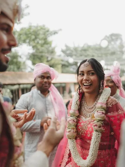 The bride's joyful expression during the wedding ceremony. We focus on capturing the genuine emotions that make your wedding day unforgettable.