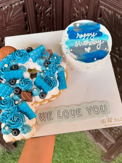 This combo includes a letter "P" monogram cake and a matching mini bento cake. It's a great option when you want a personalized message alongside a showstopper.