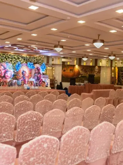Another perspective of the guest seating area and the decorated stage.