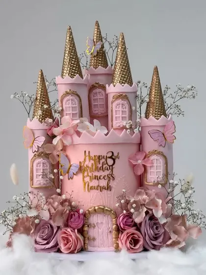 A princess castle cake that looks like it came straight out of a fairytale! This stunning pink and gold creation is perfect for a royal celebration. We help you style and photograph these elaborate cakes to highlight every magical detail.
