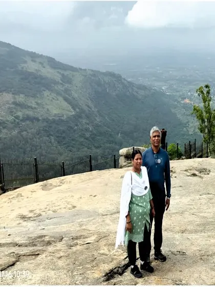 A couple enjoying the view from Nandi Hills. My trips are great for couples looking for a quick romantic getaway.