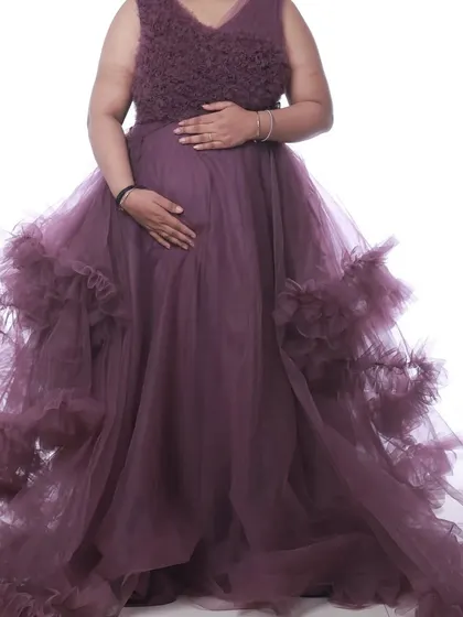 A studio shot of the mauve pastel ruffle gown, showcasing its rich color and texture. It's a versatile dress suitable for various photoshoot themes.