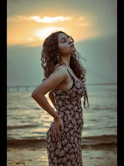 Capturing a moment of pure bliss, with eyes closed and face towards the sun. This type of lifestyle shot adds a layer of emotion and storytelling to a model's portfolio.