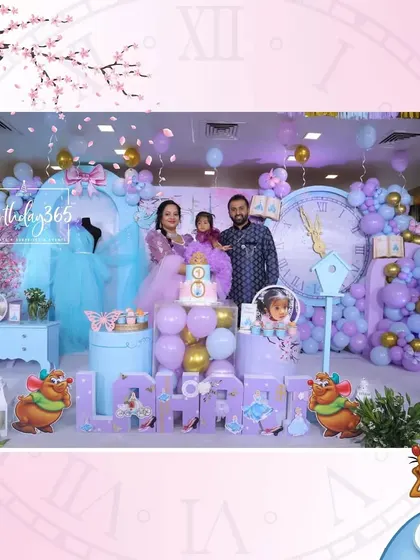 The birthday girl and her parents celebrating in front of our elaborate Cinderella-themed stage.
