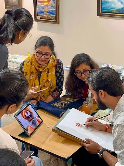 Guiding students during a figure painting session in Bangalore. My workshops are interactive, allowing for close observation and one-on-one feedback.