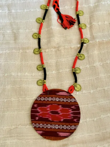 A duplicate image of the Ikat fabric pendant.
