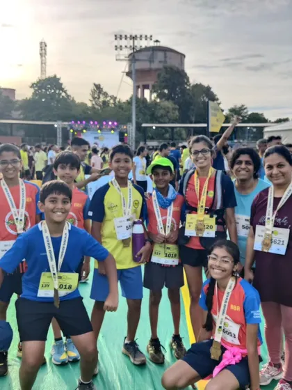 Post race smiles and medals! This is the reward for all the hard work during our training sessions. I love seeing the pride on the faces of our kids and their parents after they've completed a run.