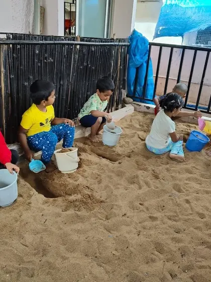 The sandpit is one of our most valuable outdoor classrooms. Here, children engage in sensory exploration and imaginative play, all while developing social skills like sharing and cooperation. It's a space for physical work, creative thinking, and joyful learning.