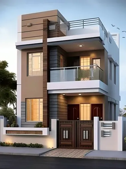 A practical and elegant design for a narrow plot, this two-story home uses vertical elements and a mix of textures to create a sense of height and distinction. The design includes a small balcony with a glass railing and a defined entryway with a modern gate.