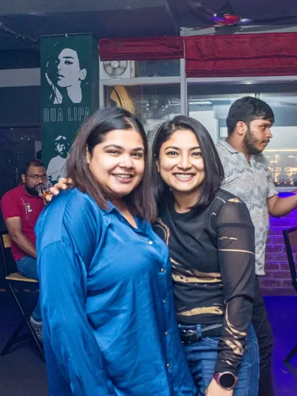 Friends catching up over drinks. The atmosphere is always friendly and welcoming, making it easy to relax and socialize.