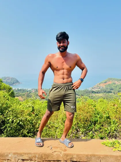 "Your body can stand almost anything. It's your mind you have to convince." Posing with a scenic natural backdrop.