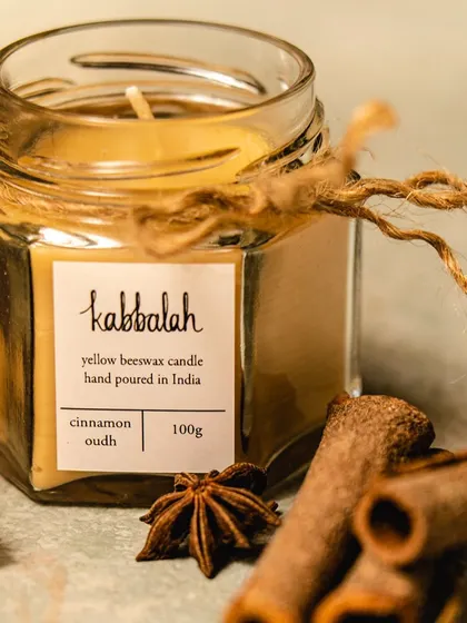 My yellow beeswax candles are hand-poured into beautiful glass jars and tied with jute string. This Cinnamon Oudh scent is warm and comforting, perfect for creating a relaxing atmosphere at home.