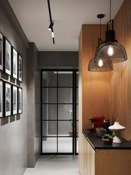 We transformed a simple passage in Zen House into a functional coffee counter with a slatted solid ash wood backdrop. This livens up an often-overlooked space and adds a useful daily ritual spot.