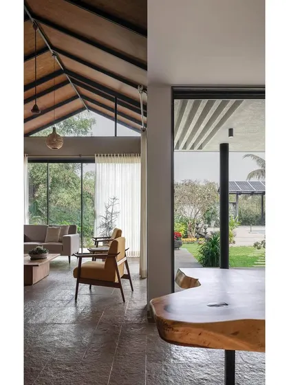 A duplicate of image 212, showing the open living and dining area of Grove House.