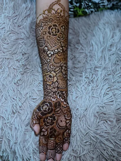 The other arm of the semi-bridal set, featuring a beautiful floral design that coordinates with the personalized hand.