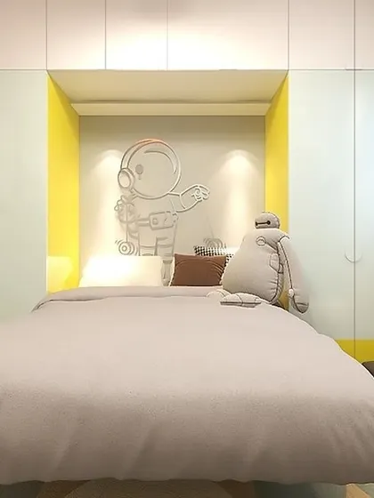 A close-up of the astronaut-themed bed nook, a cozy and imaginative space for a young dreamer.