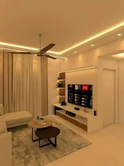 This 3D render for United Blossoms shows a clean, minimalist living room with an L-shaped sofa and effective false ceiling lighting.